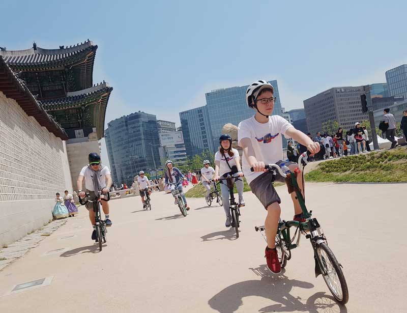 family riding bicycles in Seoul Korea premium bike tour
